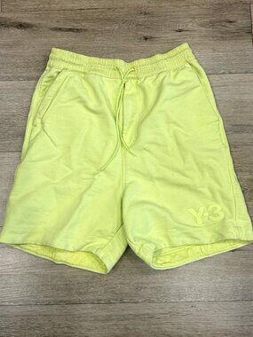 Neon yellow Y-3 shorts from the Yohji Yamamoto and Adidas collaboration.